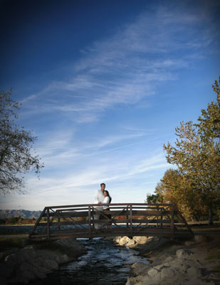 Great landscape engagement shot of a beautiful couple at a park in Orange County.