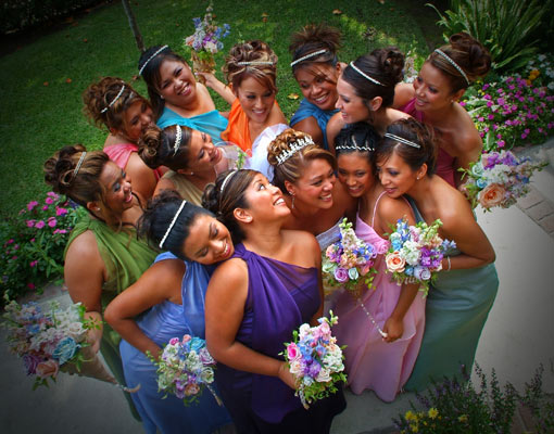 Photojournalistic photo of all the bridesmaids with the bride from above.